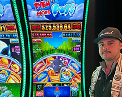 Jackpot promotion display from Owensboro Racing & Gaming — dated 2/23 — name “Chad” — showing a jackpot amount of $14,000.