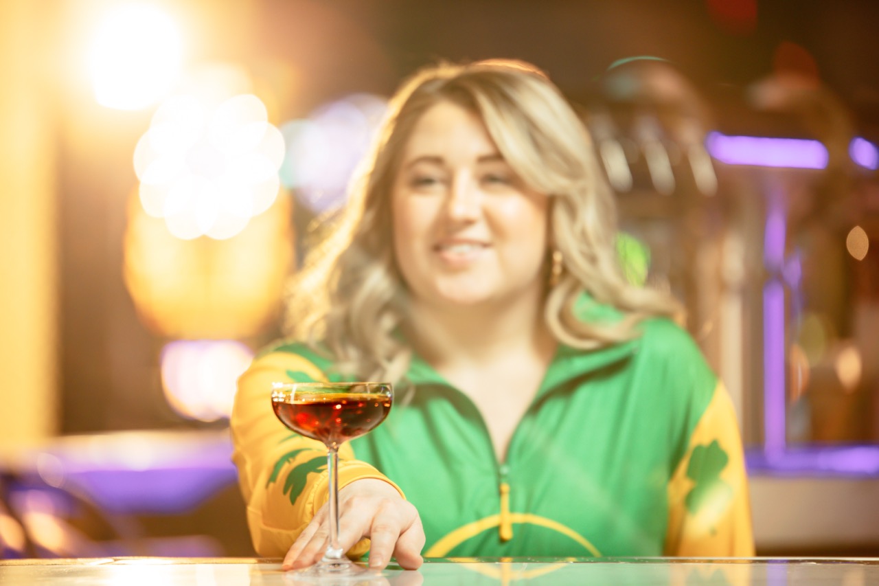 Close view of bartender serving a beverage at the bar inside Owensboro Racing & Gaming